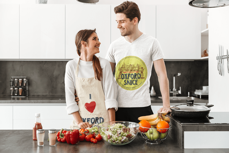 Couple wearing branded T-Shirts in Kitchen